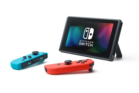 Nintendo Switch console with blue and red Joy-Con controllers on a white background