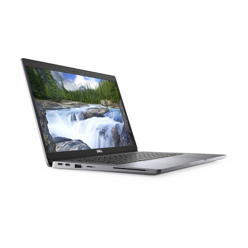 Laptop displaying a scenic waterfall on its screen with a white background