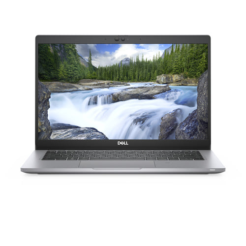Laptop displaying a scenic waterfall on the screen with a white background