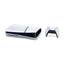 White gaming console and controller on a white background