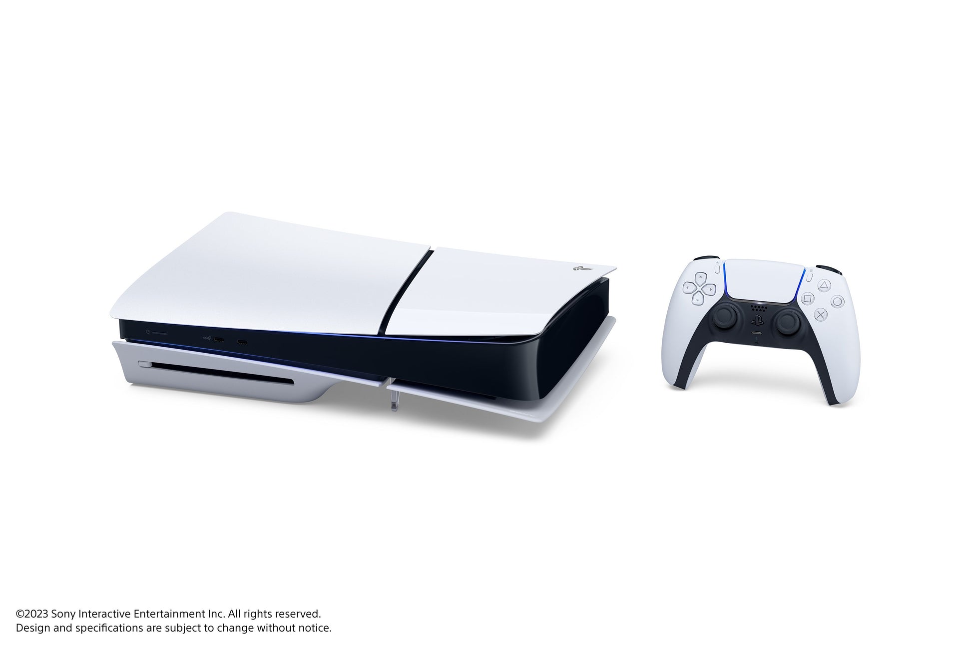 White gaming console and controller on a white background