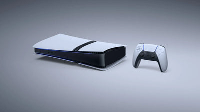 Gaming console and controller on a gray background