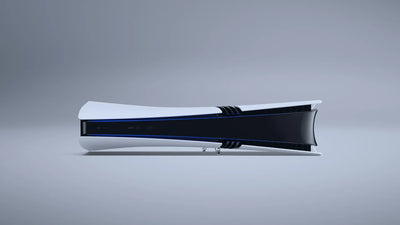 Glossy white gaming console with black accents on a gray background