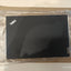 A black Lenovo ThinkPad laptop inside a brown cardboard box, wrapped in clear plastic protective film. The ThinkPad logo is visible in the top-left corner of the laptop lid, and a Lenovo logo badge is visible on the bottom-right corner.