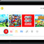 Nintendo Switch console with a game selection screen displayed on the screen.