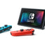 Nintendo Switch console with blue and red Joy-Con controllers on a white background